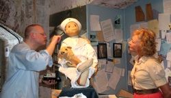 Two paranormal experts examine Robert the Doll.